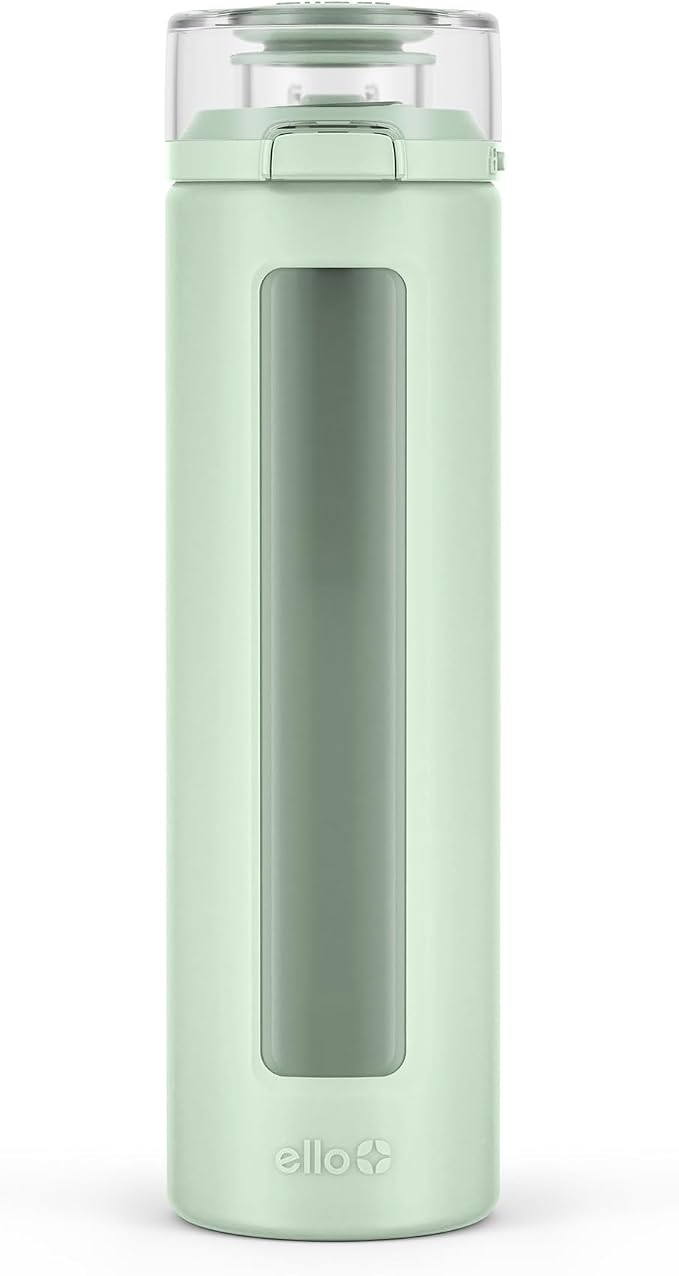 Ello Syndicate 20oz Glass Water Bottle with Flip Lid and Sleeve, Sage | Glass water bottle for iced drinks with leakproof flip lid, silicone sleeve, carry loop, BPA-free, and dishwasher safe