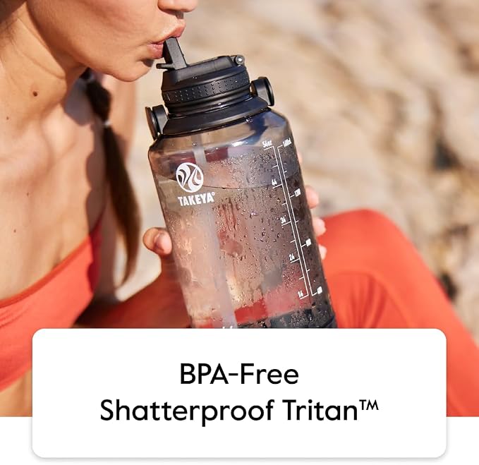 Takeya Motivational Water Bottle with Straw Lid and Time Marker (64 oz, Pistachio Green) - Leakproof, BPA Free Water Bottle for Daily Intake Tracking