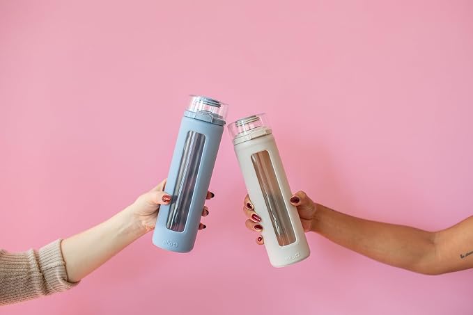 Ello Syndicate 20oz Glass Water Bottle with Flip Lid and Sleeve, Tech Blue | Glass water bottle for iced drinks with leakproof flip lid, silicone sleeve, carry loop, BPA-free, and dishwasher safe