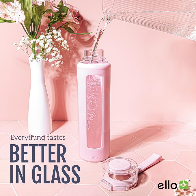 Ello Syndicate 20oz Glass Water Bottle with Flip Lid and Sleeve, Sand | Glass water bottle for iced drinks with leakproof flip lid, silicone sleeve, carry loop, BPA-free, and dishwasher safe