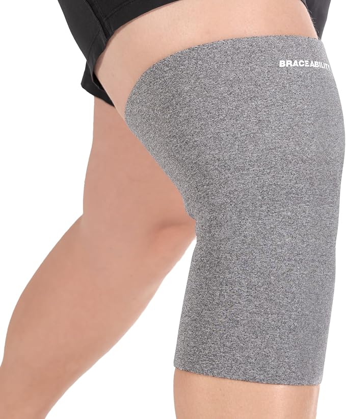 BraceAbility Plus Size Neoprene Knee Sleeve - Knee Compression Sleeve for Large Legs and Big Thighs, Arthritis Joint Pain and Support Knee Brace for Obese - Fits Men and Women (4XL - Gray)